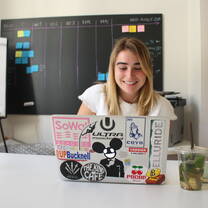 Absolute intern working from her laptop