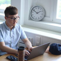 Absolute Alumnus working remotely from a co-working space