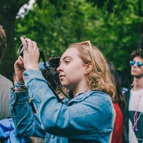 man taking a photo