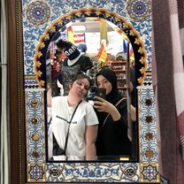 Selfies in souvenir shop This picture is of me and one of my amazing friends I met while in language school in Madrid!
