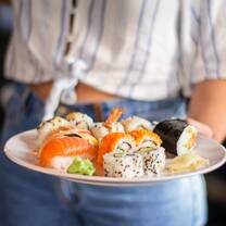 Join our local guide for a tour of the famous Tsukiji fish market, and get introduced to the intricate art of sushi-making.