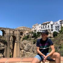 Me sitting in front of a bridge in Ronda, a town close to Malaga