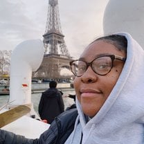 Me in front of the Eiffel Tower.