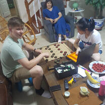 Me playing chinese chess against a child from the host family.