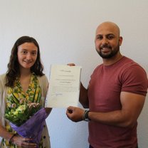 Sarah receiving her certificate