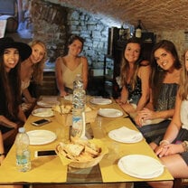 Students sitting around a table for lunch