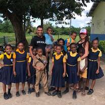 V2 Volunteer and Vacation.  Support disadvantaged children in schools
