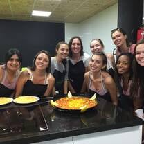 Students cooking paella