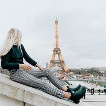 Girl in foreground, with Eiffel Tower in background