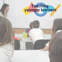 Children in class and teacher at board. Text: Teaching younger learners