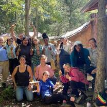 group picture smiles at natural building school