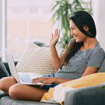 Young woman learning on laptop