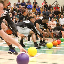 Student activity day playing dodgeball