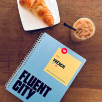 French book and croissant