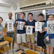 KCP students show off their calligraphy skills.