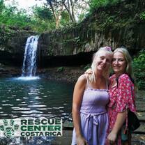 volunteers by waterfall