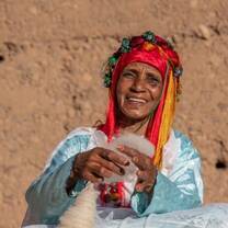 A woman spinning wool 