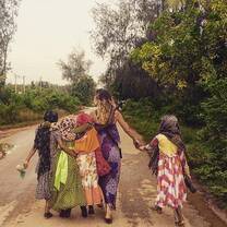 A volunteer with children, PDS Zanzibar, Tanzania
