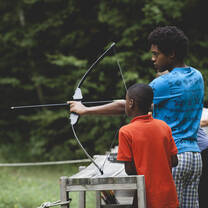 You could teach archery to retreat guests.