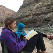 Students read during downtime in the Colorado River canyons