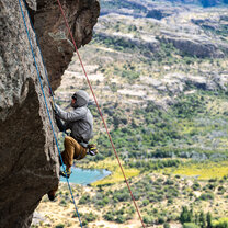 A student rock climbing