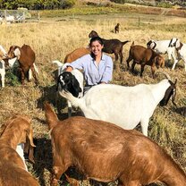 Visions participant with goats.  Fall Gap participant visits a ranch with goats.