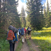 Summer ranch kids hiking in Montana