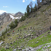 Spring hiking in Montana Visions participants backpacking in Montana