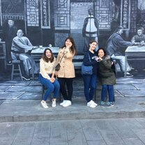Students at mural in Harbin