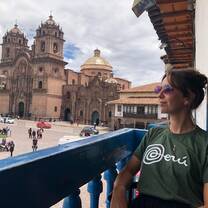 Volunteer enjoying the view of the Plaza de Armas in Cusco