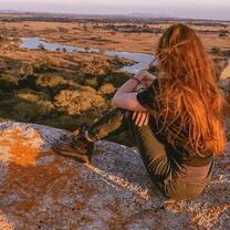 Volunteer looking out over conservancy from high up