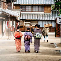 Women walking through streets of Japan