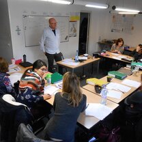 An input theory session with trainees discussing in pairs An input theory session with trainees discussing in pairs