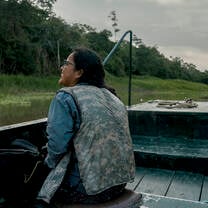 student on the river
