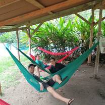 Volunteers hang out in hammocks at the Sea Turtle Rescue Project in Costa Rica