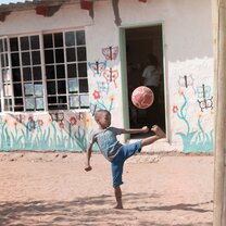 child playing with a ball