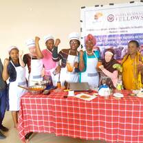 Members of a community organization that empowers women living with a disability learn about entrepreneurship 