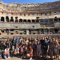 Group in Italy in front of colosseum 