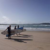 Students surfing on the beach