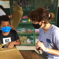 An international volunteer teaching art