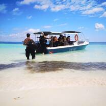 Loading the boat at the Bira Project