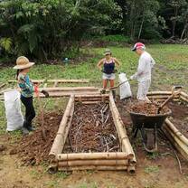 Help build and prepare planting beds