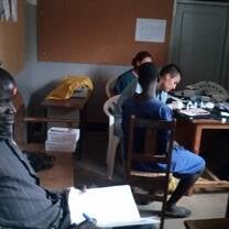Medical volunteers working with their Ugandan counterparts at a hospital