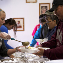 Students serving meals Students serving meals