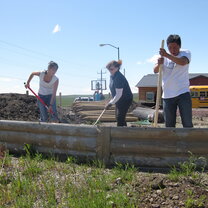 Student volunteers building demonstration garden Building demonstration garden