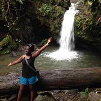 Posing near a water fall 