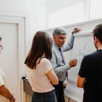 The participants asking questions from the professor