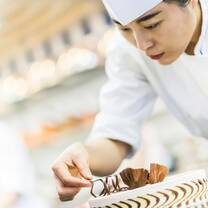 Students in the kitchen during Cuisine Diploma program at Le Cordon Bleu