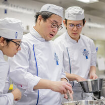 Students in the kitchen during Cuisine Diploma program at Le Cordon Bleu Students in the kitchen during Cuisine Diploma program at Le Cordon Bleu