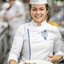 Students in the kitchen during Cuisine Diploma program at Le Cordon Bleu
